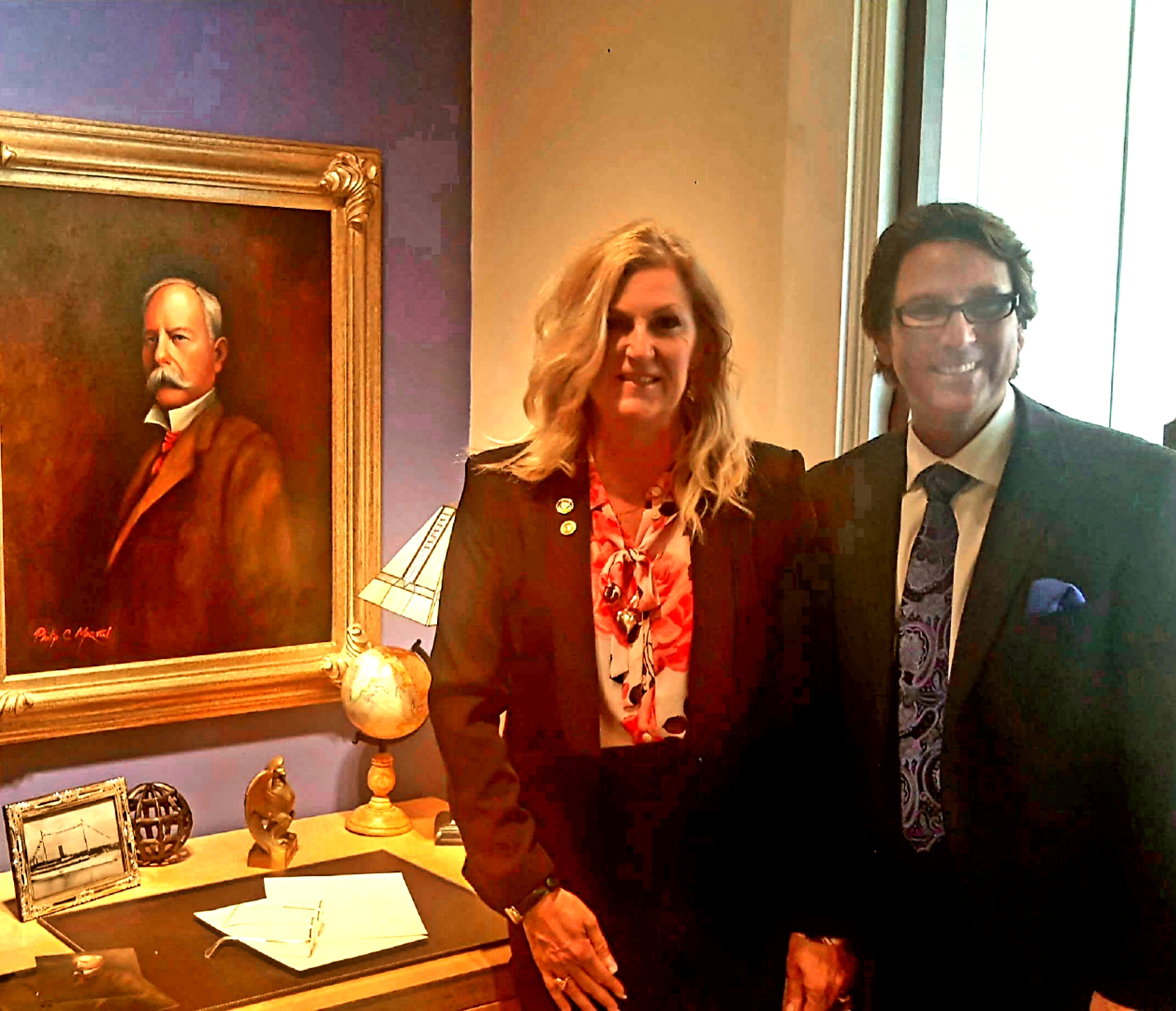 Dr. Perry and Judith Mansfield with an oil painting of John D. Spreckels