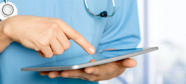 Doctor Holding Tablet