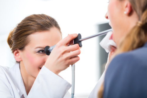 Doctor Examining Patient